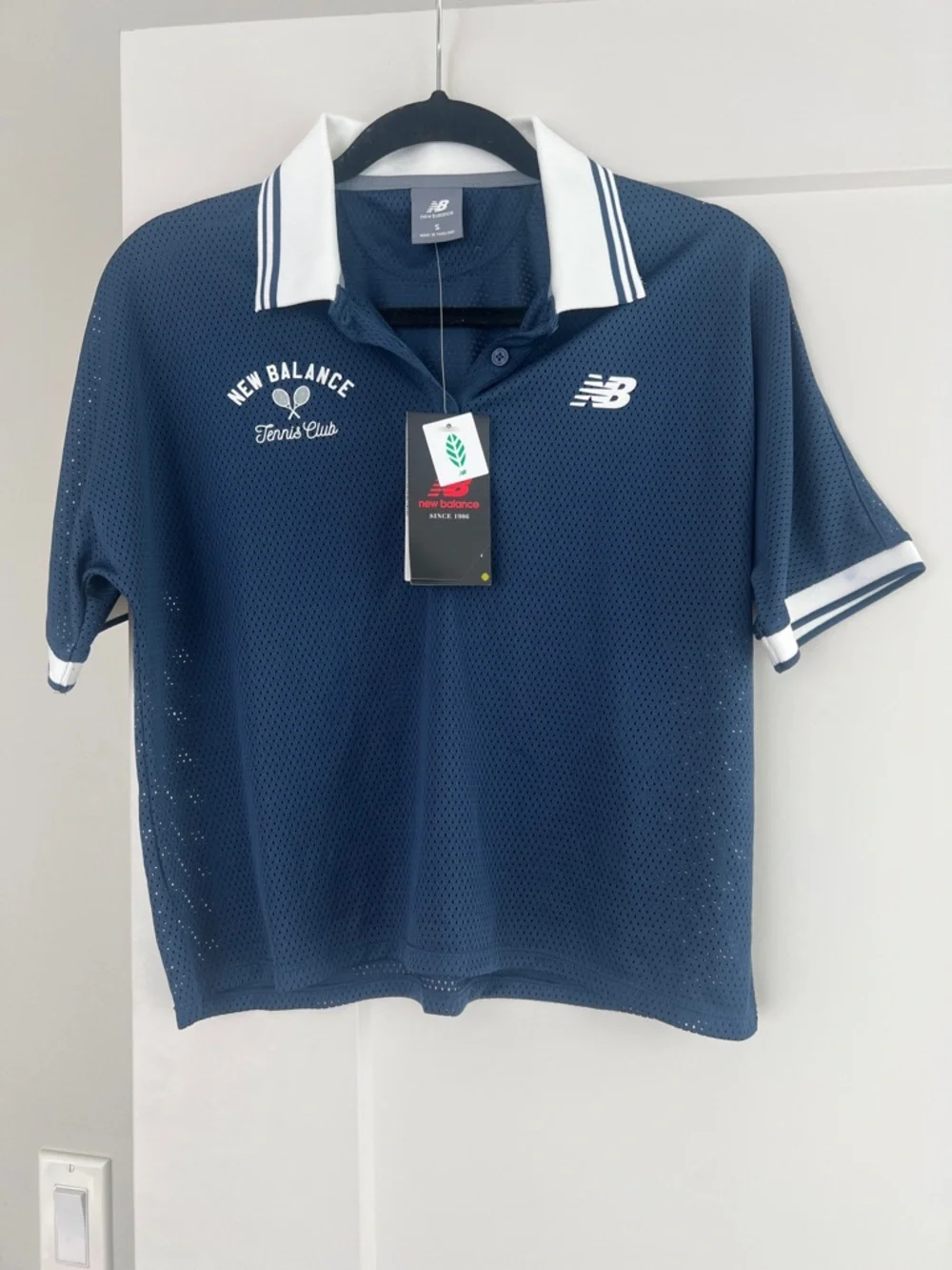 New Balance Navy Polo with White Trim - Picture 1 of 2